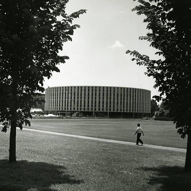 Black and white photo of Harrelson hall surrounded by grass