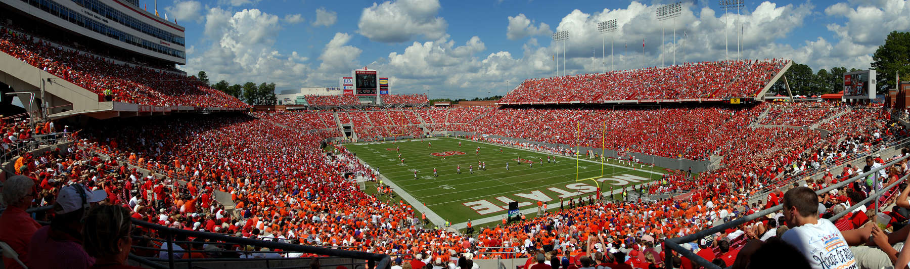 Fans packed into the stands create a sea of red in Carter-Finley Stadium