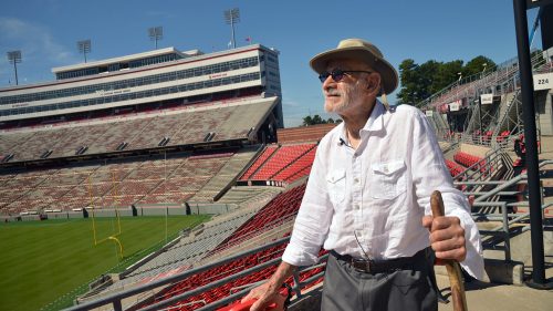 Former NC State design professor Charles Kahn looks out at Carter-Finley, the stadium he designed.