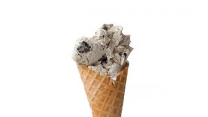 Cookies and cream ice cream on a waffle cone