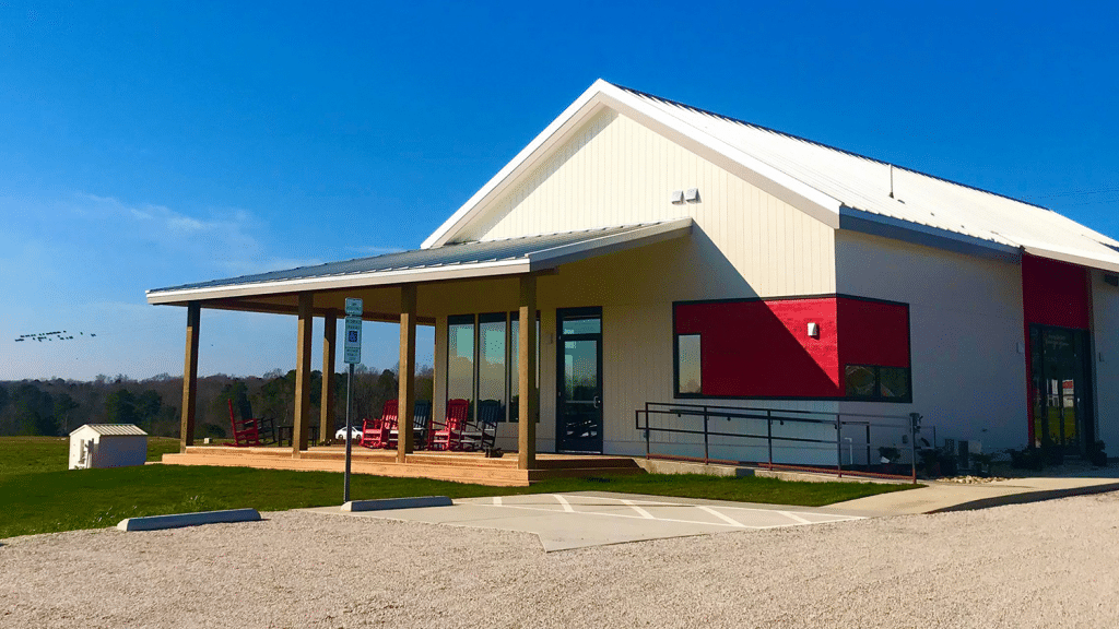 An exterior view of the Howling Cow Dairy Education Center and Creamery.