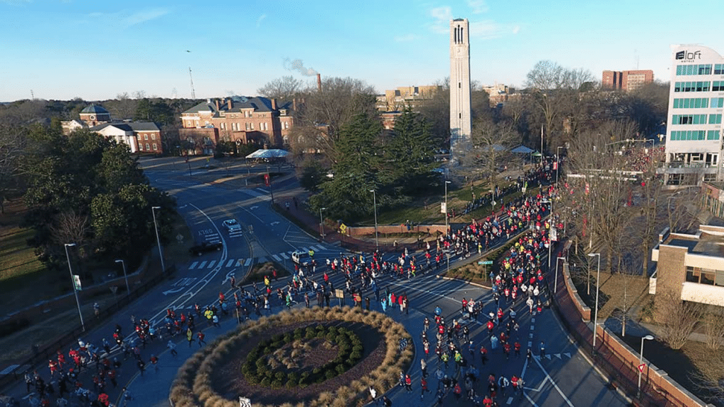 An aerial view of people running the Krispy Kreme Challenge.
