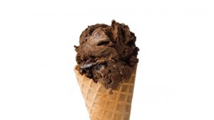 Cherry Brick Road ice cream on a waffle cone