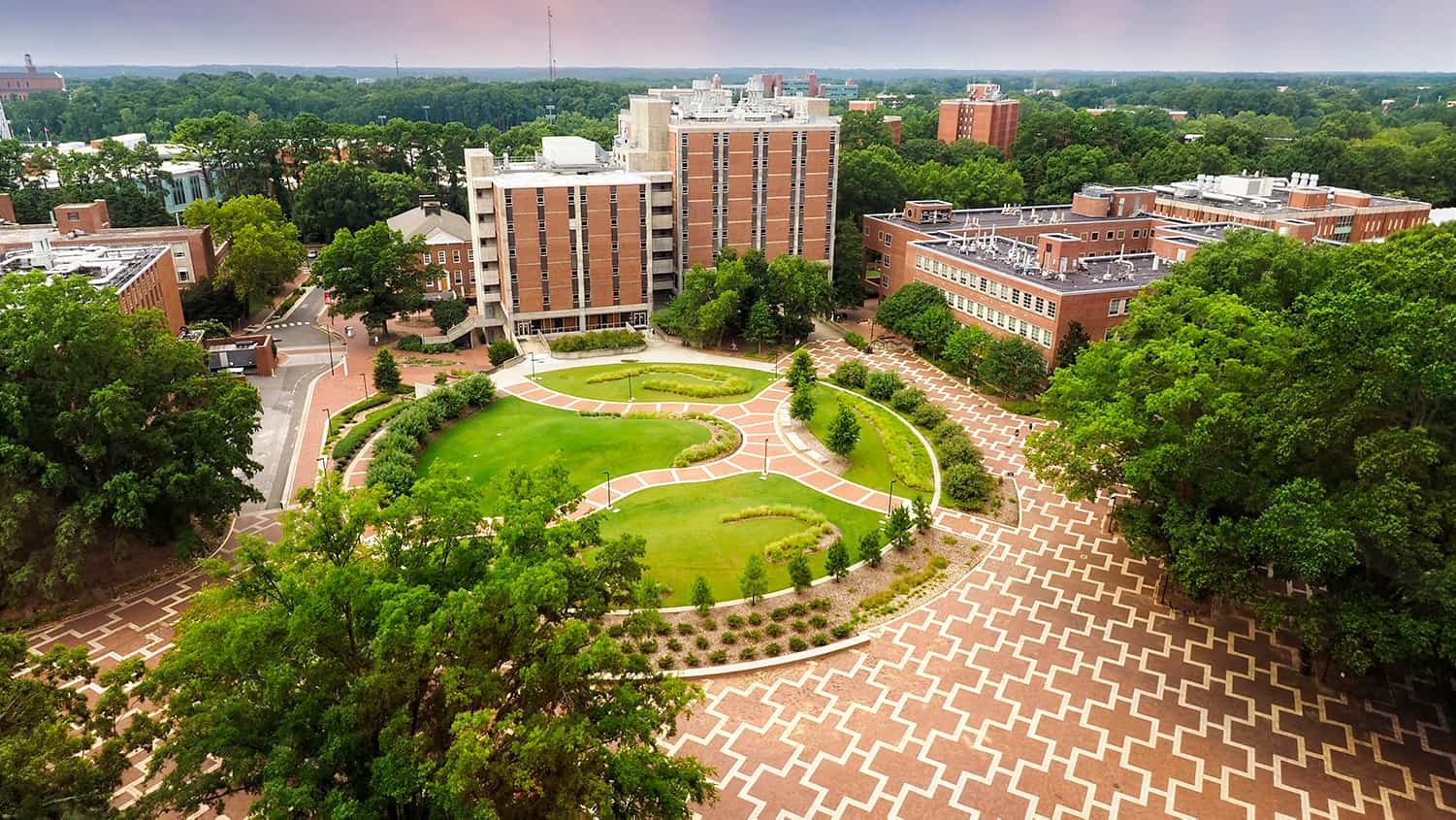 An aerial view of the Brickyard, showing its red and white geometric pattern.