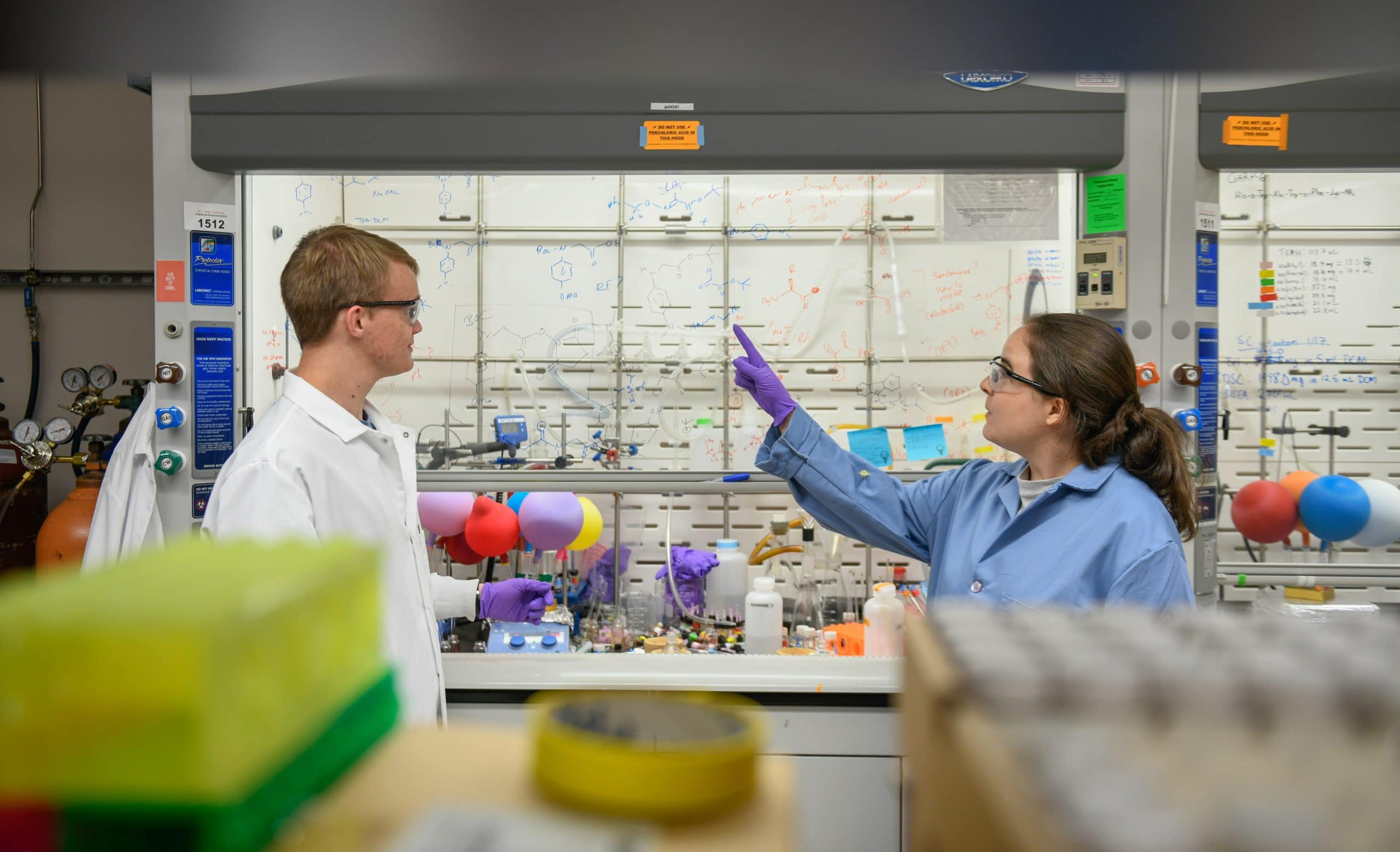 Students work in a chemistry lab on main campus.