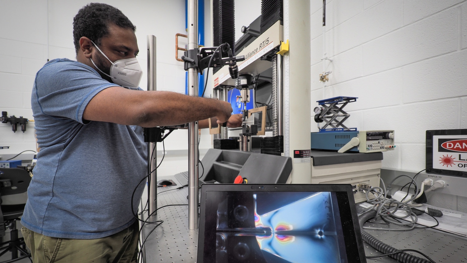 A graduate research student works in the labs of the newly completed Fitts-Woolard engineering building on Centennial Campus.