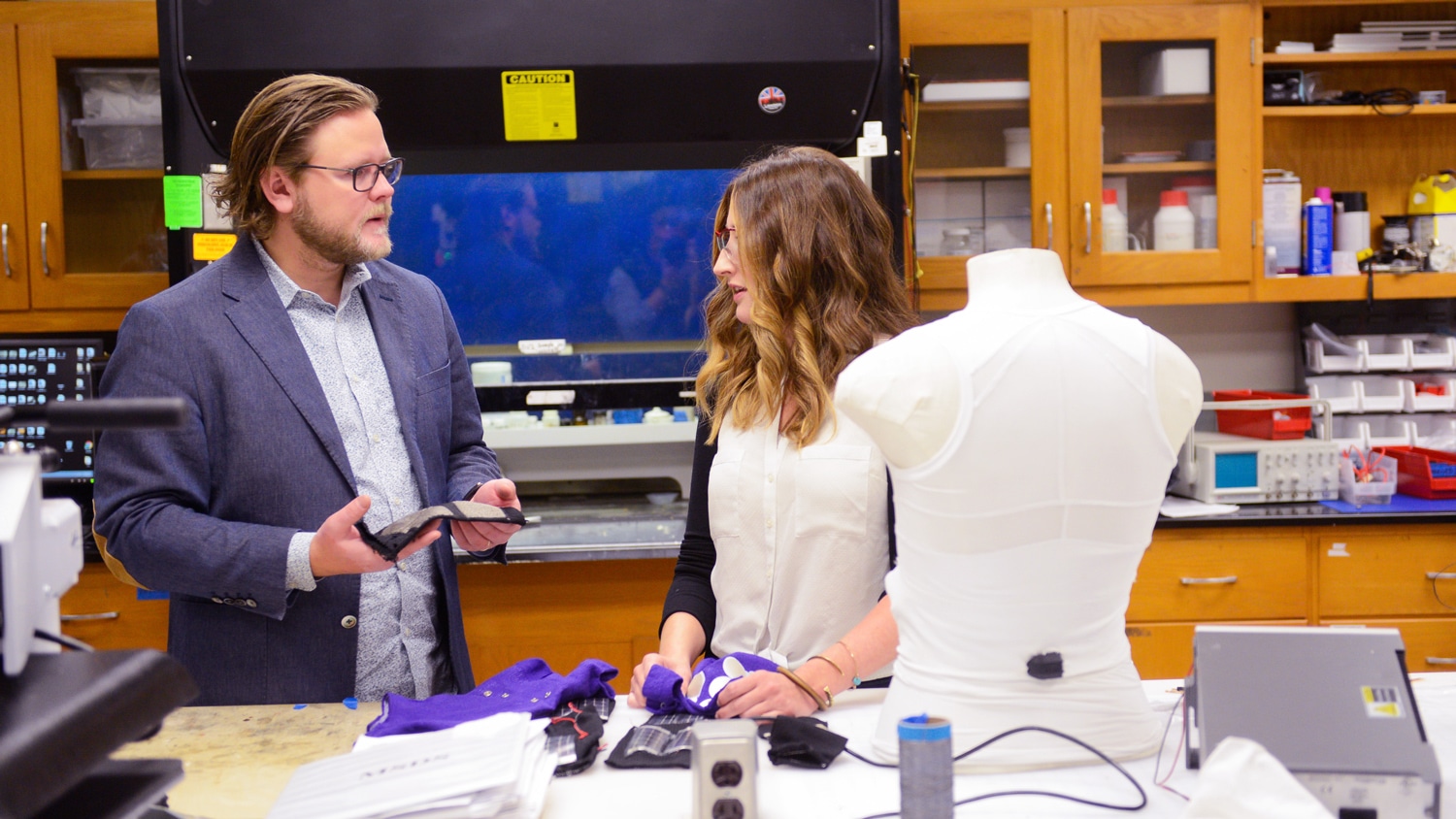 Stuents work in the lab of Jess Jur in Textiles.