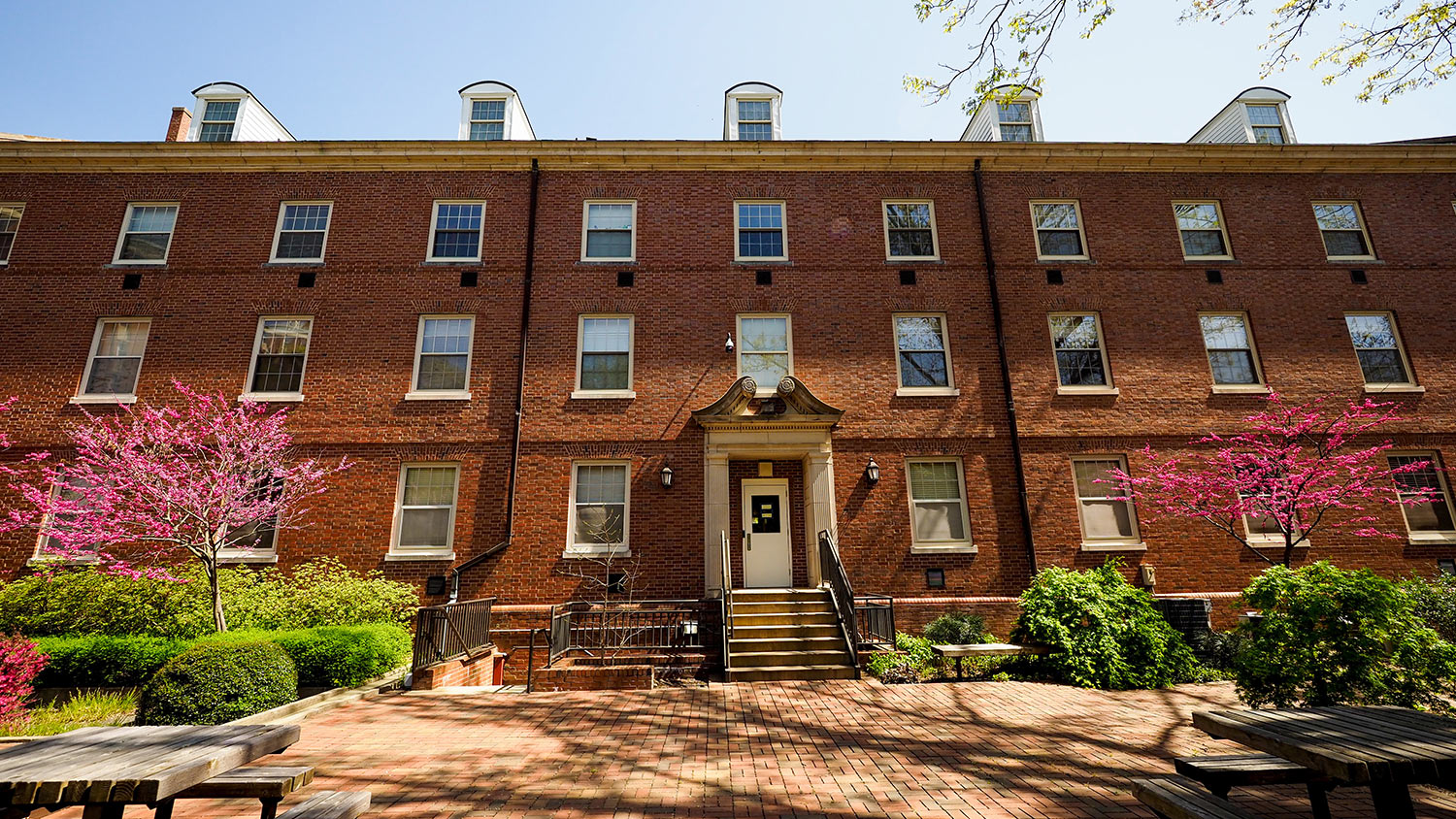 An exterior photo of Turlington residence hall during spring.