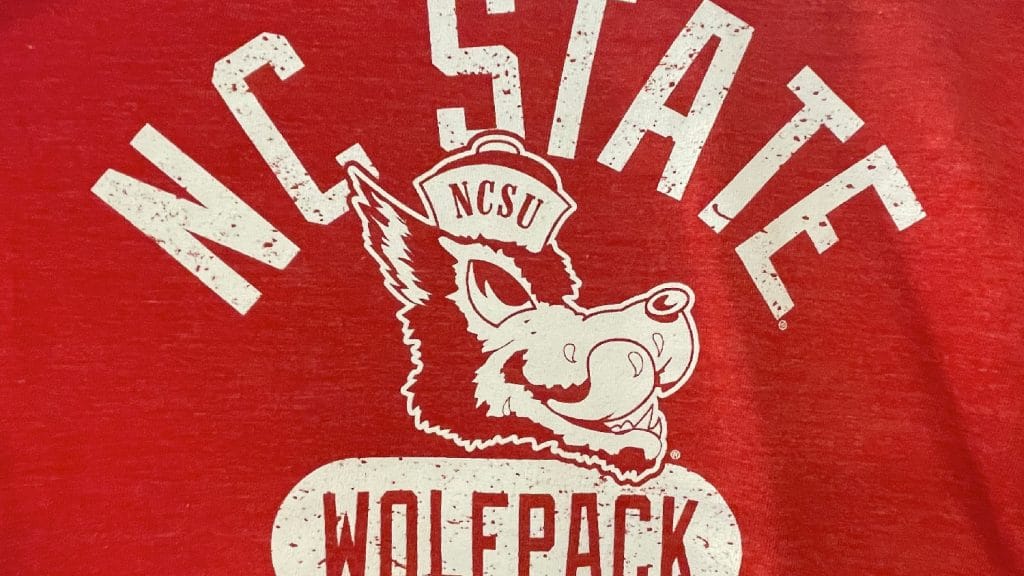 A t-shirt with a slobbering wolf logo.