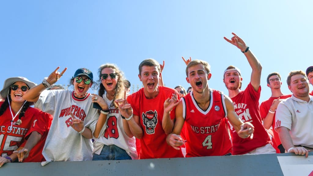 Students cheer during the NC State/ECU football game at Carter Finely stadium.
