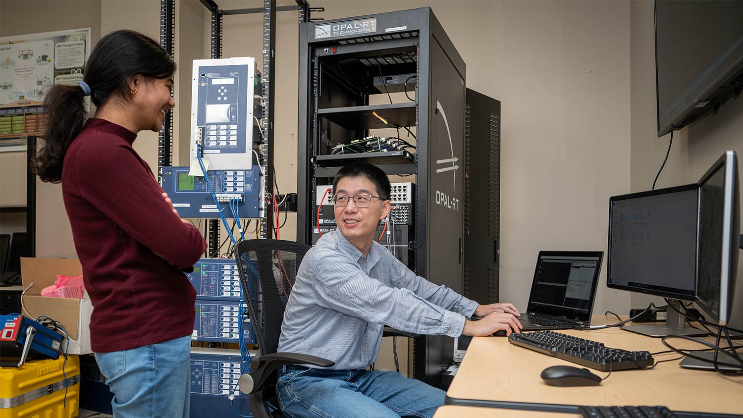 Graduate students work in the FREEDM Center. In 2008, the National Science Foundation chose NC State to lead an effort to create a modern power grid.