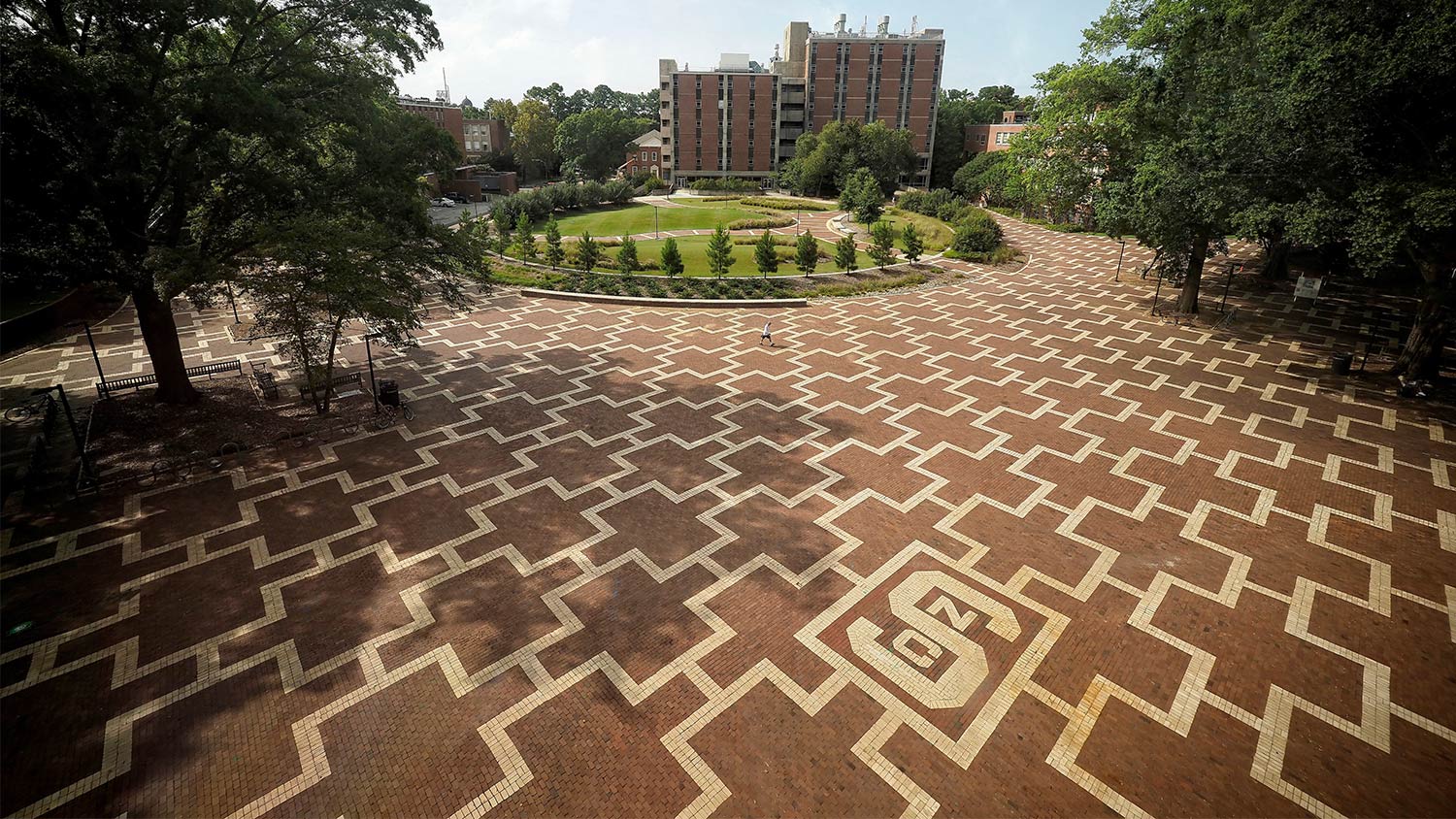 A view of the brickyard through a window in DH Hill library.