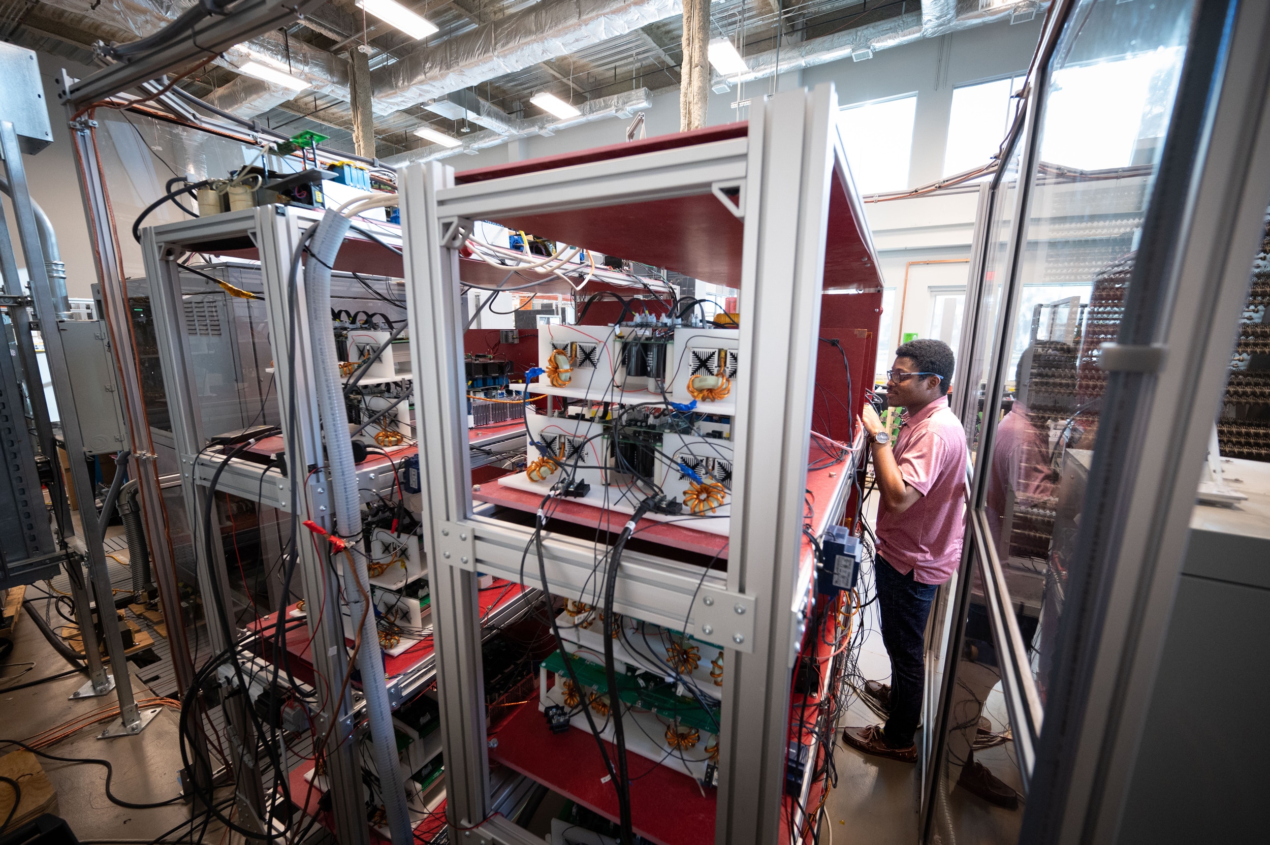 A graduate studnets works inside of the FREEDM Center on Centennial campus.