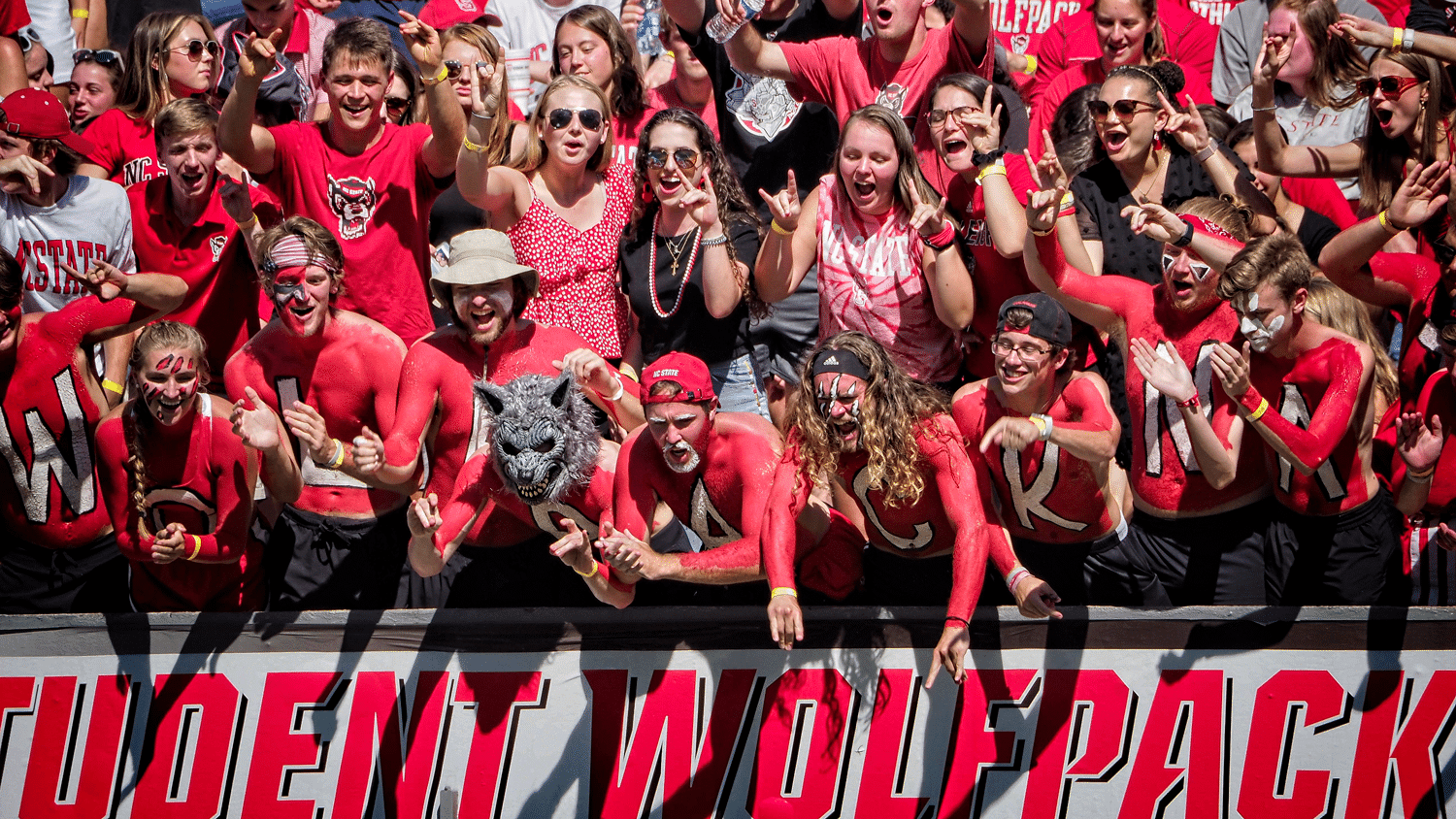 NC&#160;State student fans cheer on the Wolfpack during their overtime win over Clemson in 2021.
