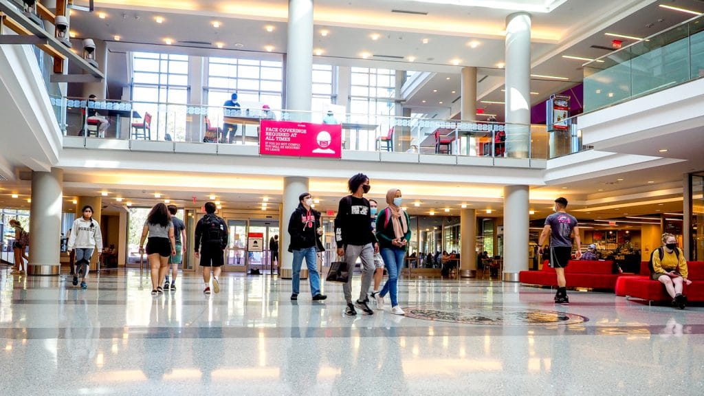 Students move through the Talley Student Center on the first spring-like day of 2021. 