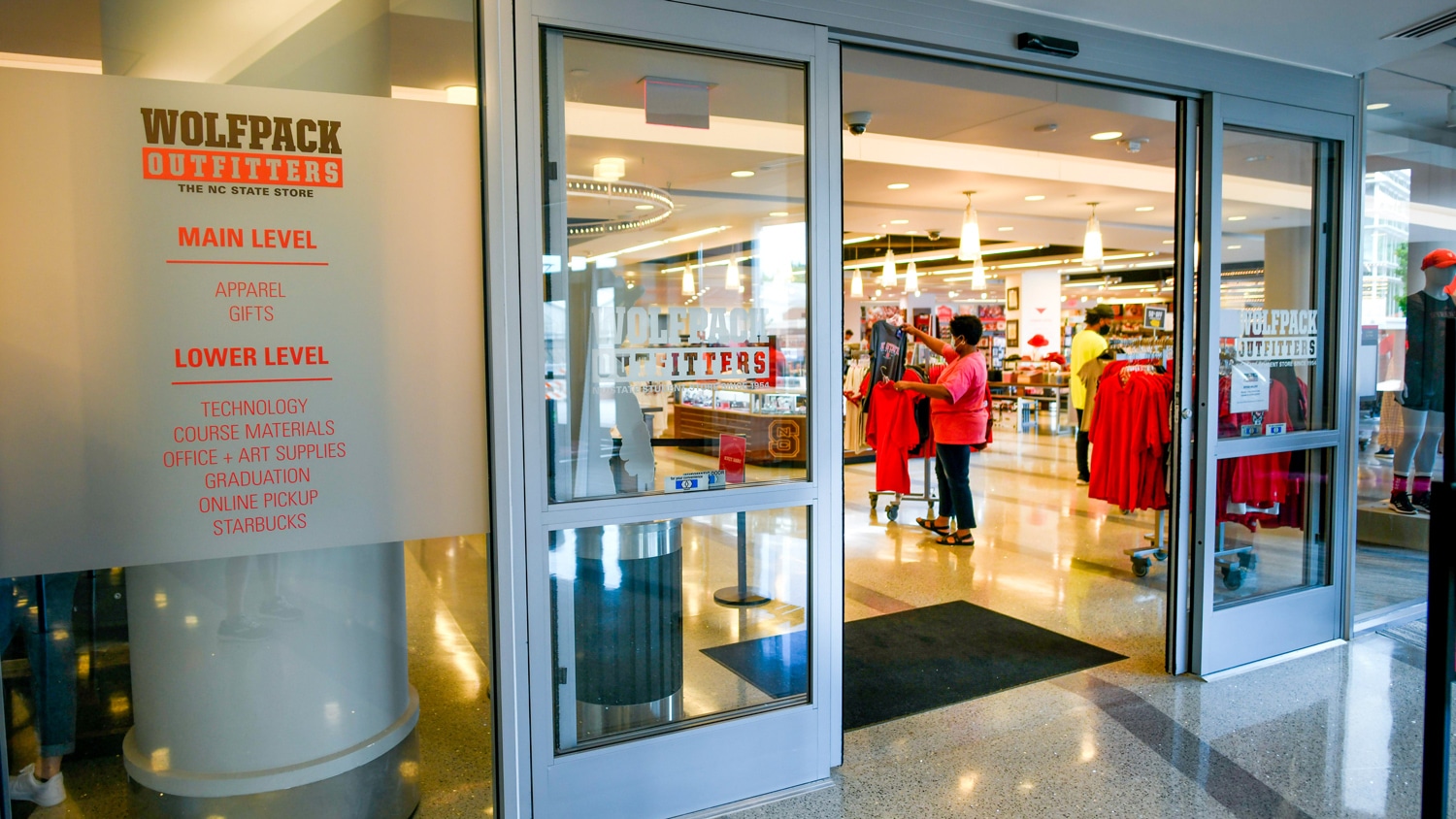 Parents and students shop at Wolfpack Outfitters