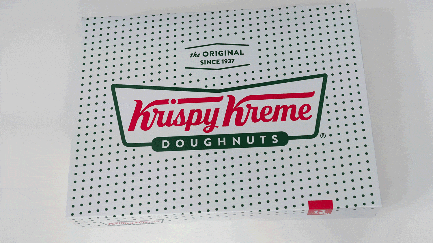 A GIF shows a box of Krispy Kreme donuts being opened and closed.