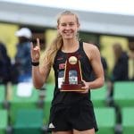 Sophomore Katelyn Tuohy shows off her trophy after winning the NCAA 5,000-meter championship in Eugene, Oregon.