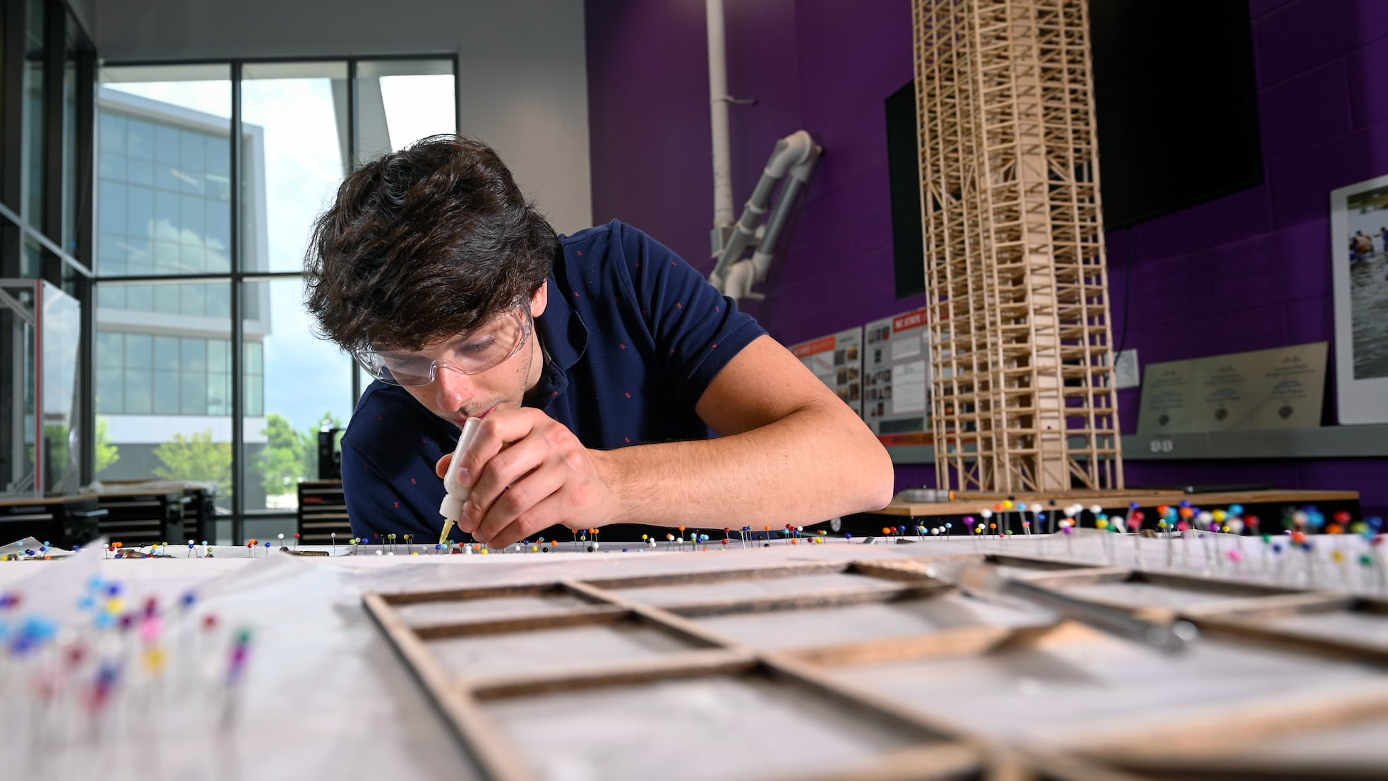A civil engineering student at work in the Fincher Lab in Fitts-Woolard Hall.