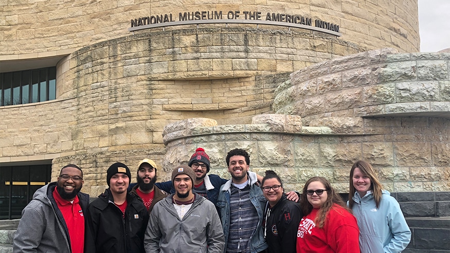 Native Space residents and staff pose together outside the National Museum of the American Indian in Washington D.C.