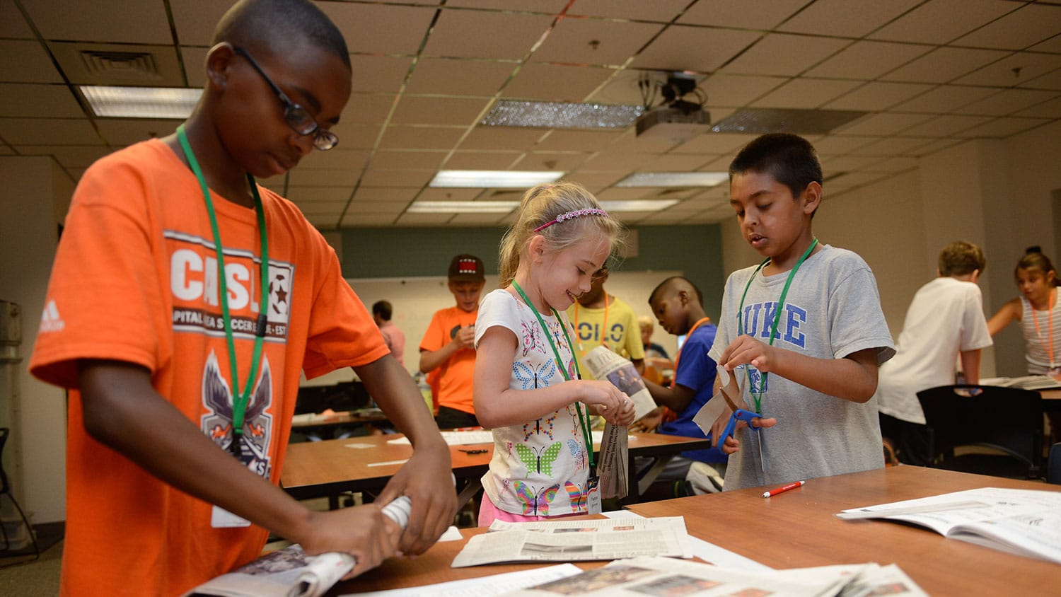 Elementary-age students take part in a hands-on engineering project during summer camp.
