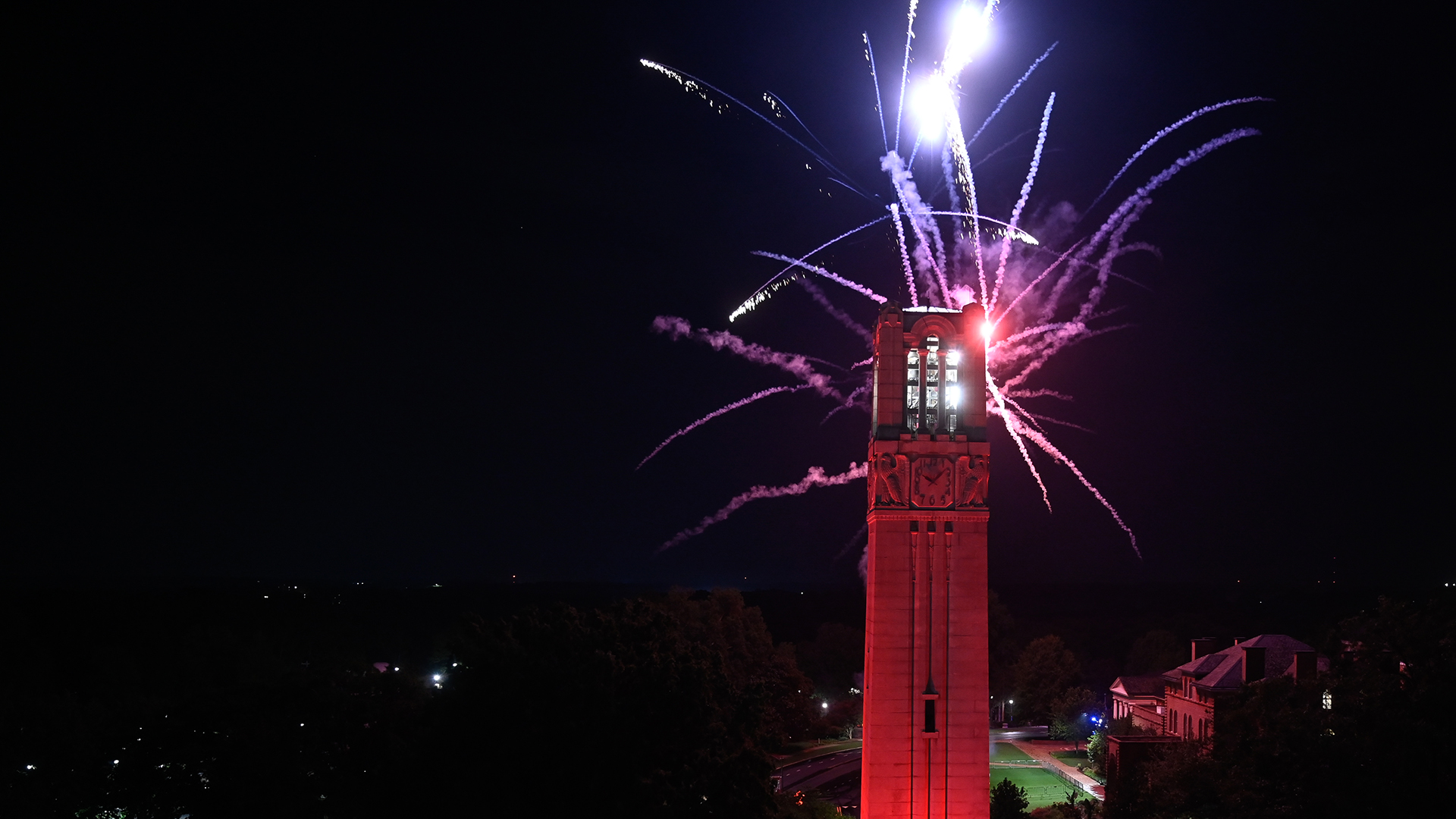 Colorful fireworks light up the sky above the Memorial Belltower as a send-off to Packapalooza.