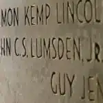The name John C.S. Lumsden Jr., inscribed in granite