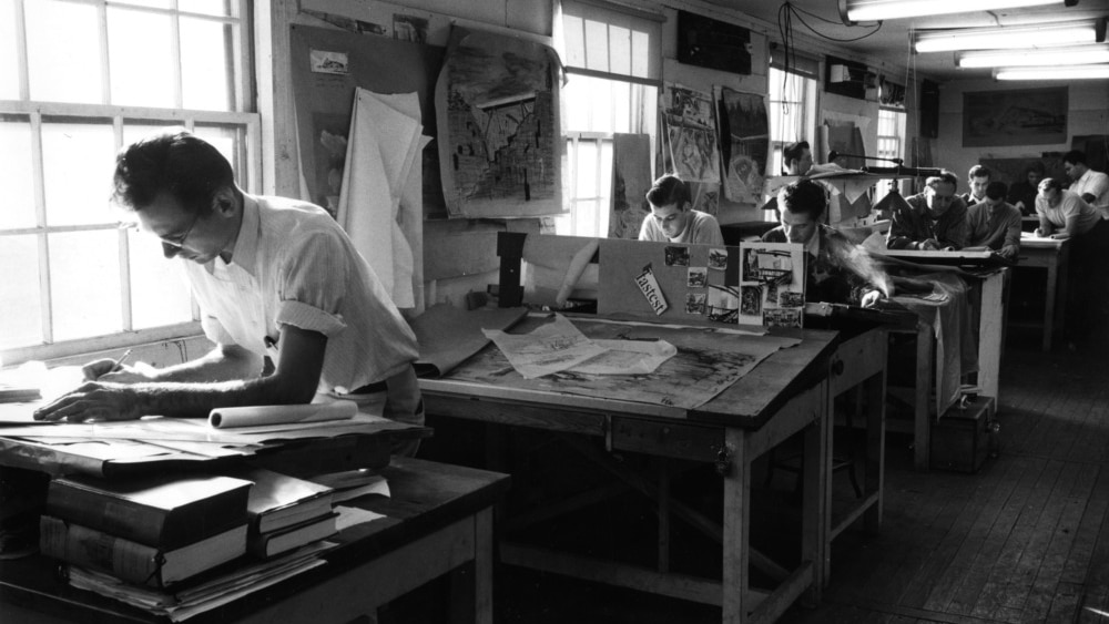A photo from the 1950s shows School of Design students working at drafting tables.