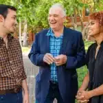 Walt Wolfram stands with fellow researchers Lydia Elrod and Brody McCurdy.