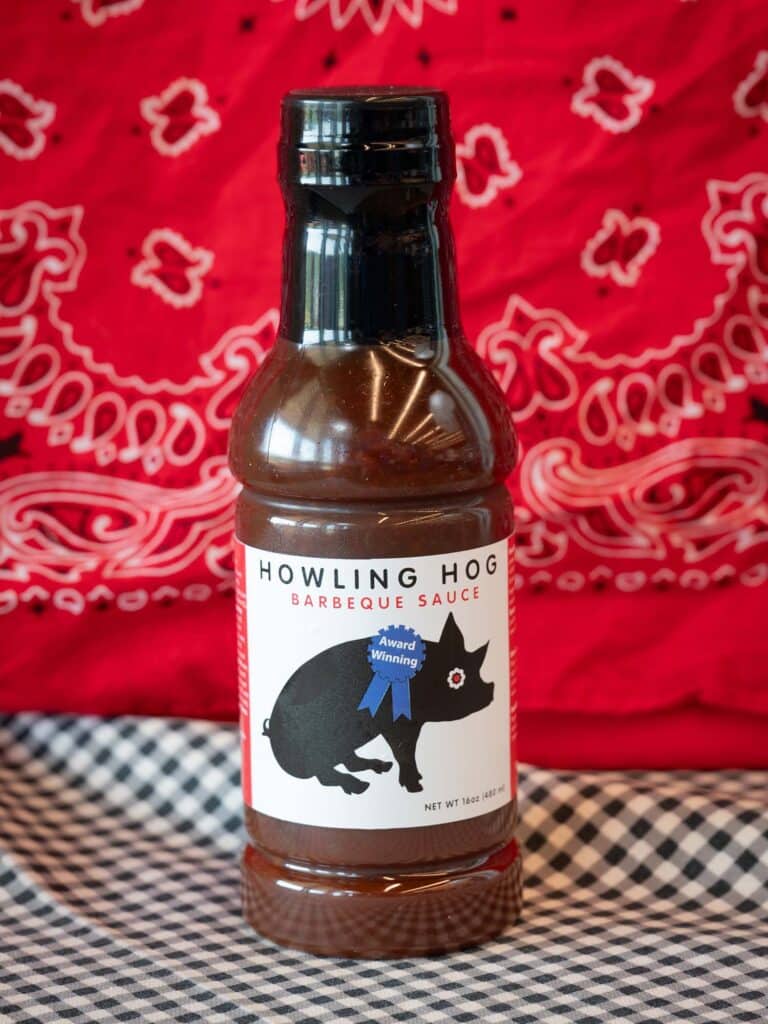 A bottle of Howling How barbecue sauce.