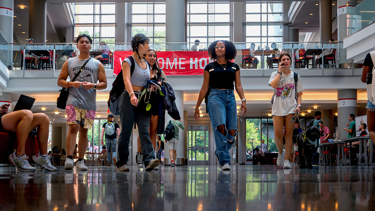 Students make their way across campus during the first day of class for the fall 2023 semester.