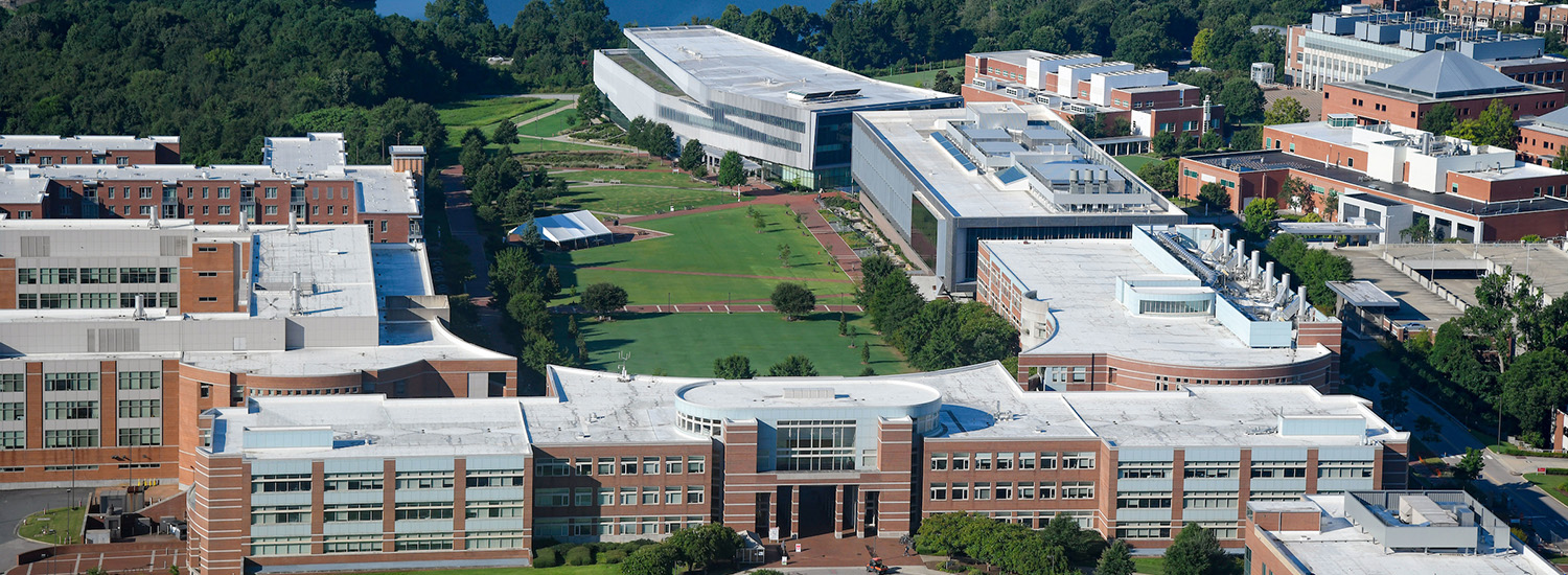 An aerial view of Centennial campus, which includes the Oval, Hunt Library, Fitts-Woolard Hall and various College of Engineering buildings.