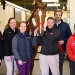 Members of the NC State College of Veterinary Medicine ophthalmology and Large Animal Hospital teams pose with Myra during her last week in the hospital in January.