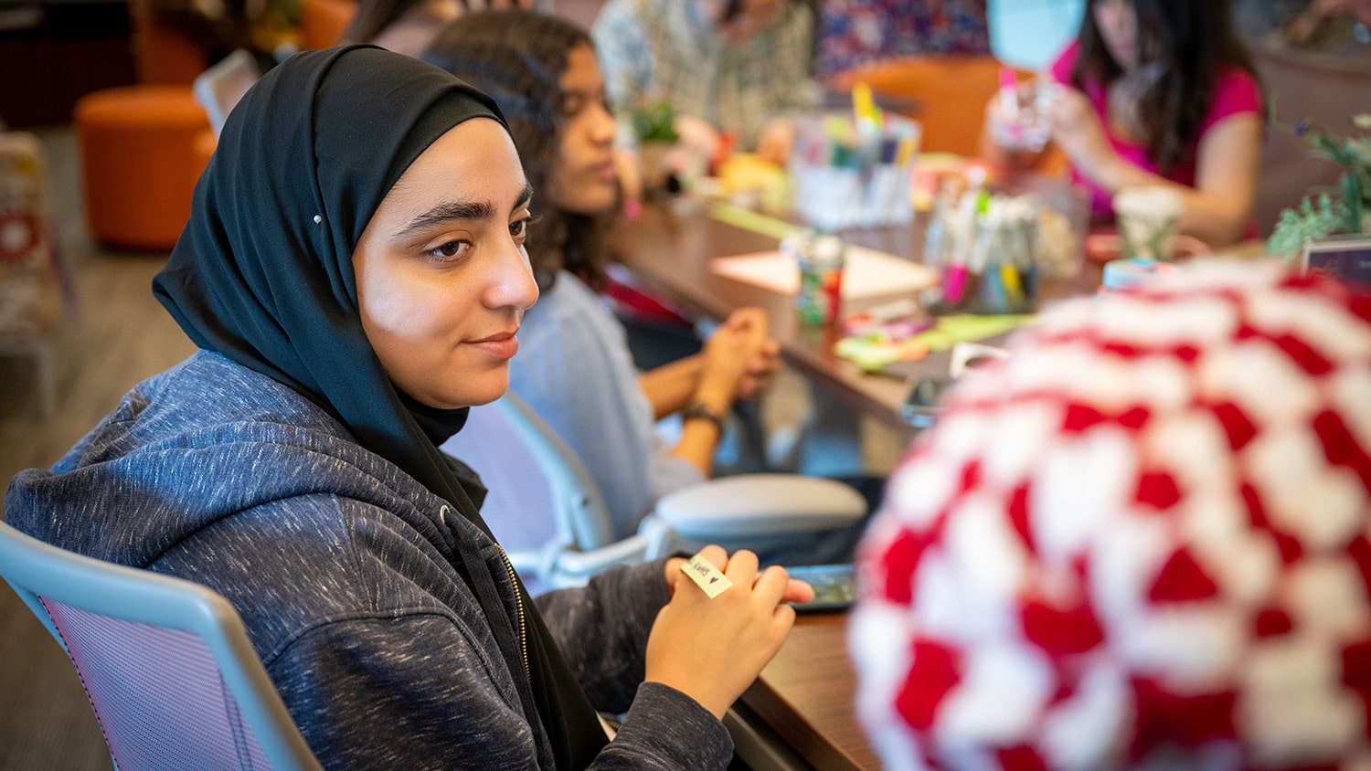 Students attend a Crafting + Connecting event in the Women's Center.