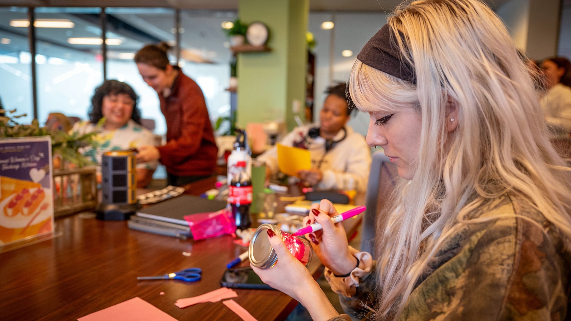 Students take part in a Crafting + Connecting event in NC State's Women's Center.