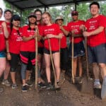 ASB students on a trip to Guatemala grab their shovels and get ready to work.