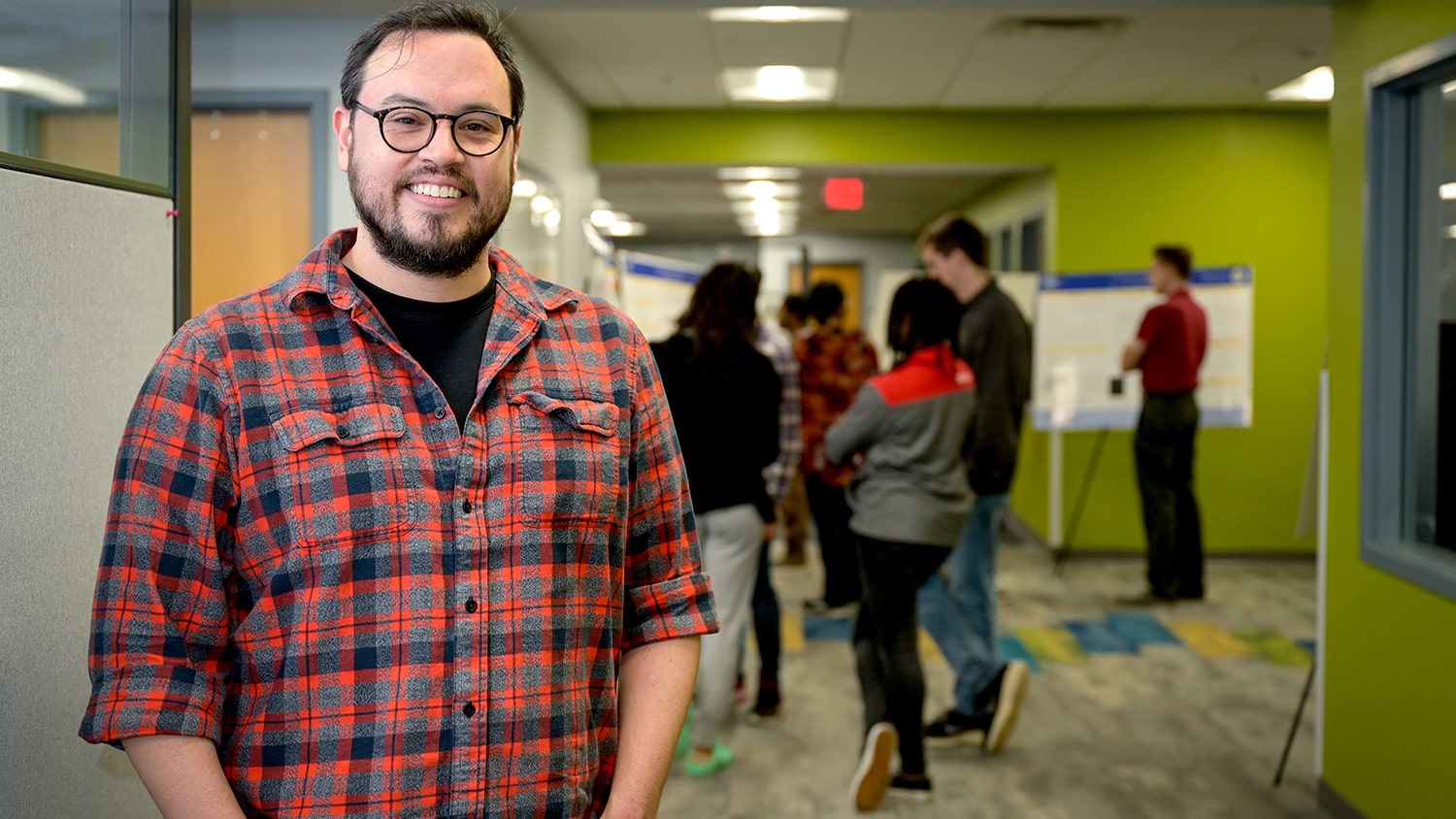 Ben Hines, a graduate physics student, is a key part of the new partnership between the Organic and Carbon Electronics faculty cluster and Wake Technical Community College's STEM Academic Research and Training Program.