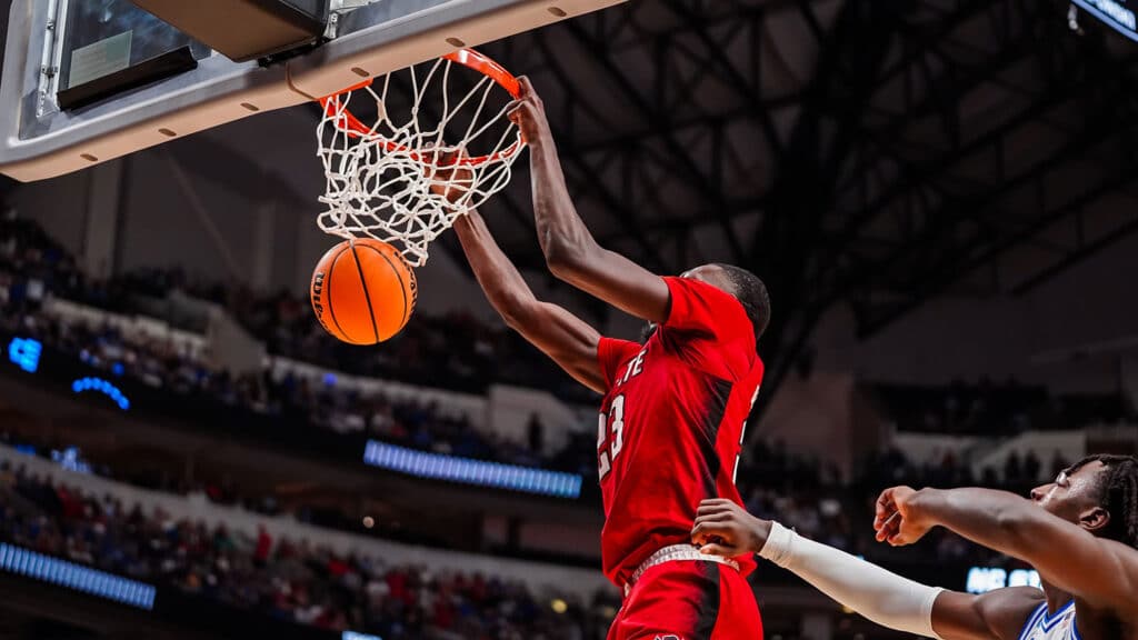 The Wolfpack men's basketball team competes against Duke in the 2024 NCAA Championship Elite Eight game.