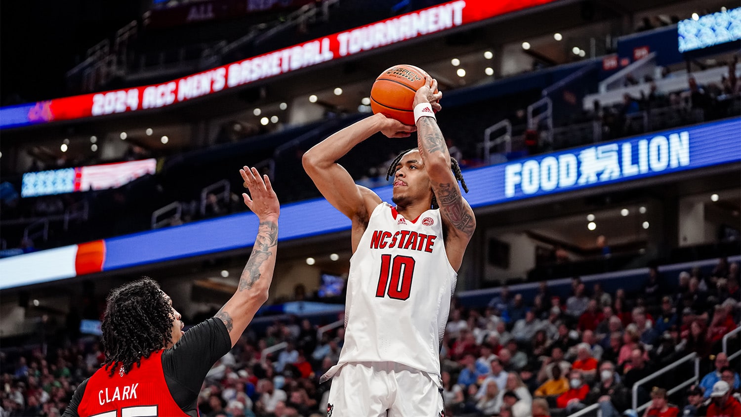 Breon Pass goes up for a jump shot during a 2024 ACC Tournament game against Louisville.