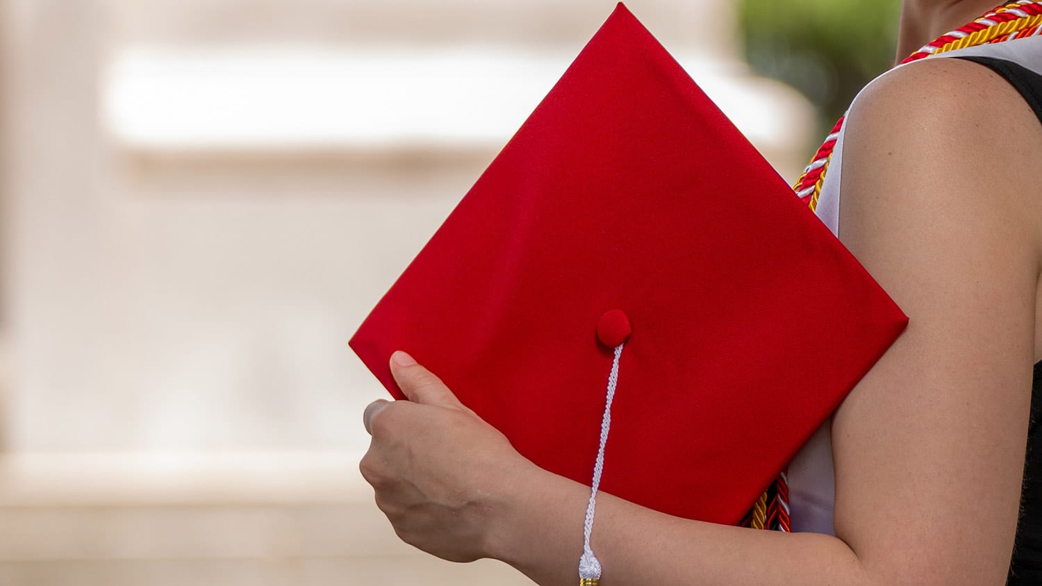 A red graduation cap.