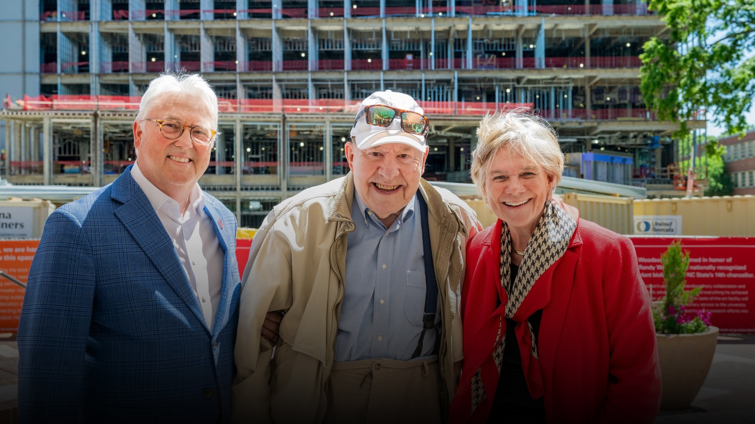 Chancellor Randy Woodson, Thomas S. "Tom" Kenan III and Nancy Cable at the site of Woodson Hall. 