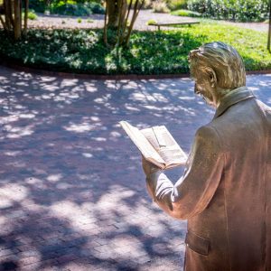The Strolling Professor statue on NC State's campus.
