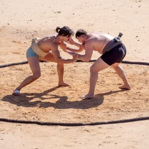 Jared Faulk ’22, left, wrestles with Seth Adams, who recently qualified for the 2025 Sumo World Championships to be held in Thailand in September.