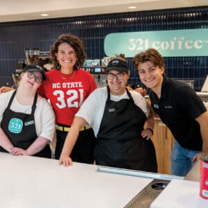 321 Coffee employees celebrate the opening of the shop's new Centennial Campus location.
